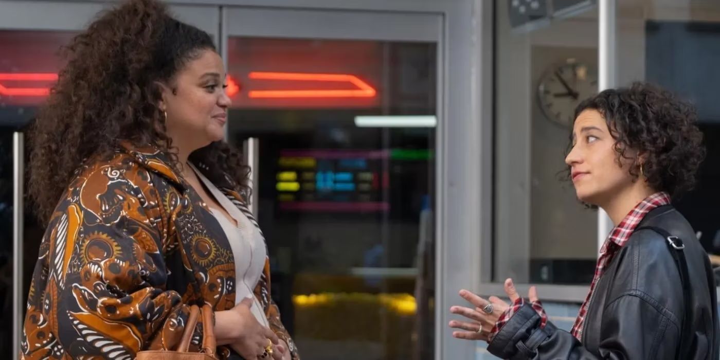 Michelle Buteau and Ilana Glazer speak to each other on the street in Babes