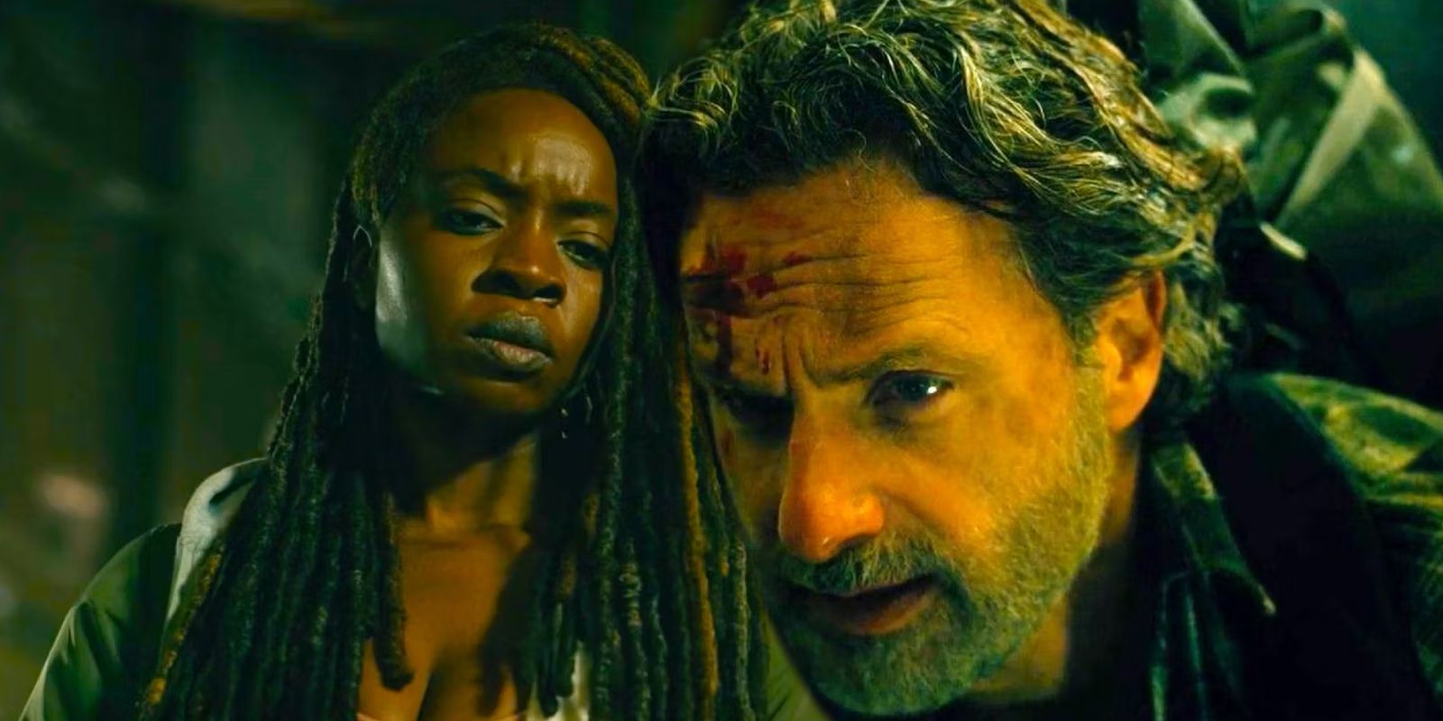 Michonne looking down and Rick bleeding from the forehead in The Walking Dead The Ones Who Live episode 5