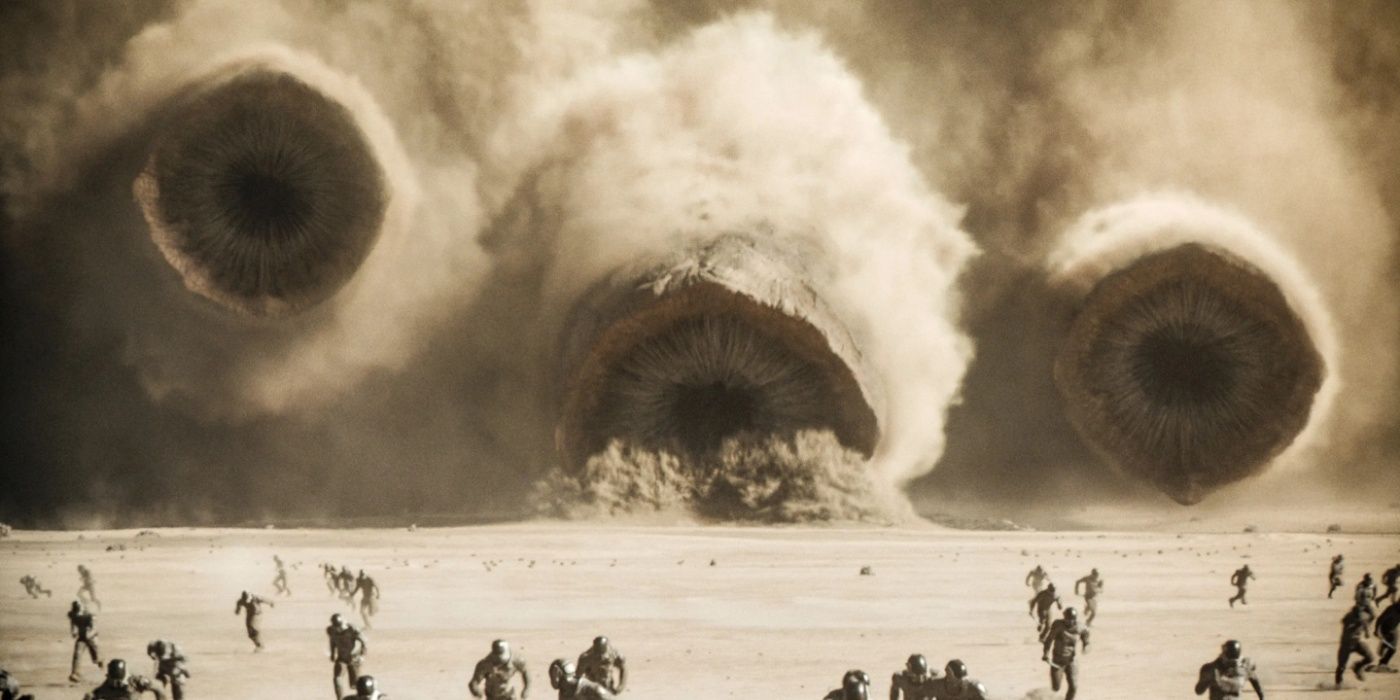 Soldados Harkonnen fugindo dos vermes da areia em Dune Parte 2