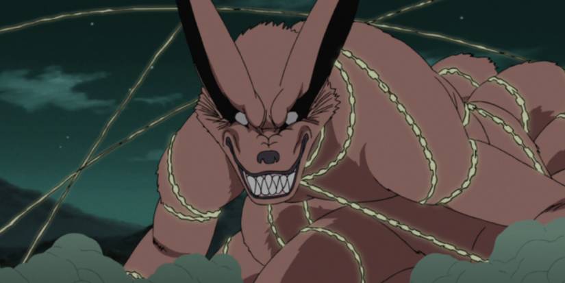 Naruto Shippuden's Kurama is growling after being bound in yellow chains of energy.