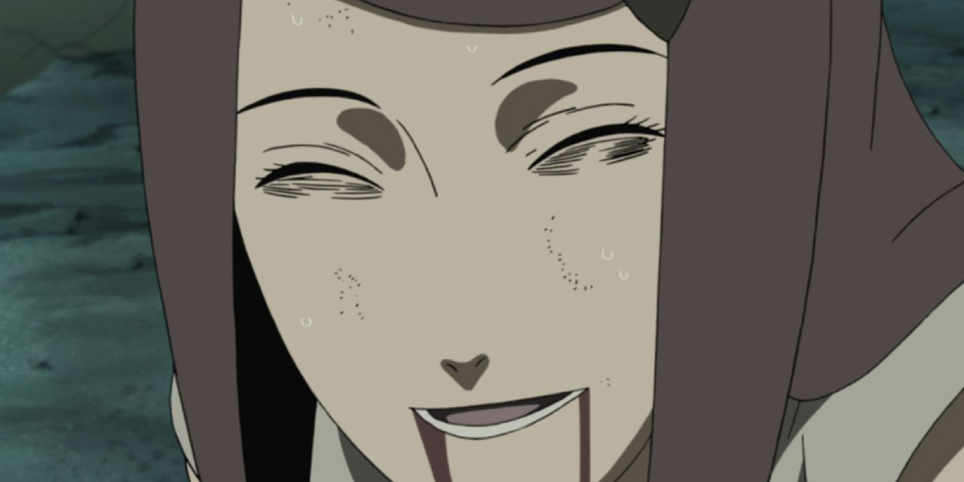Naruto Shippuden's Kushina smiles despite bags under her eyes and blood coming out of her mouth.