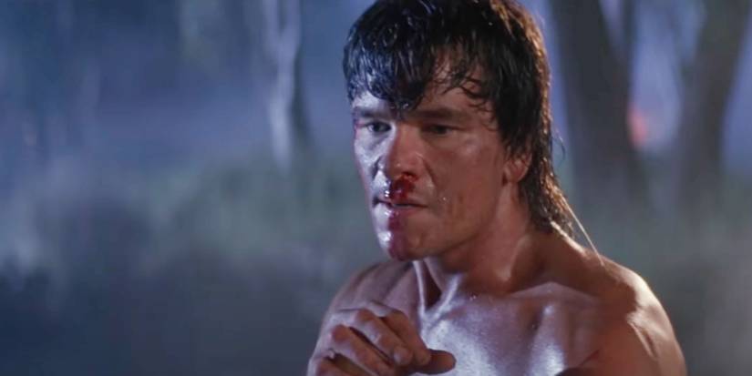 Patrick Swayze as James Dalton in readying himself for a fight while covered in blood in Road House.