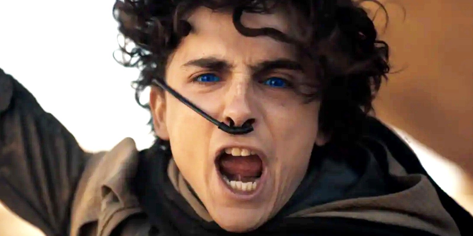 Paul Atreides played by Timothée Chalamet streaming in front of the Fremen in Dune 2, establishing his role as their messiah