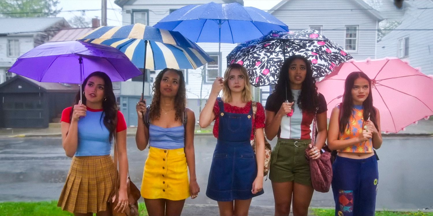 Noa, Tabby, Imogen, Faran, and Minnie standing side by side, each holding an umbrella in Pretty Little Liars Summer School season 2