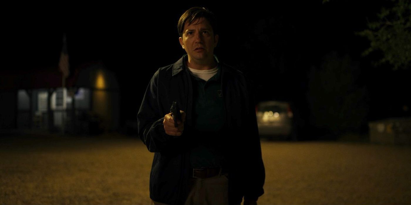 Ray (John Magaro) pointing a gun in LaRoy Texas.