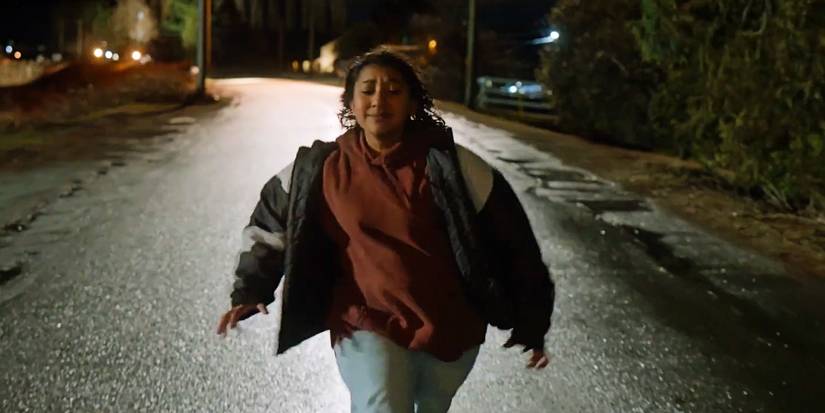 Reena Virk runs down the road in Under the Bridge