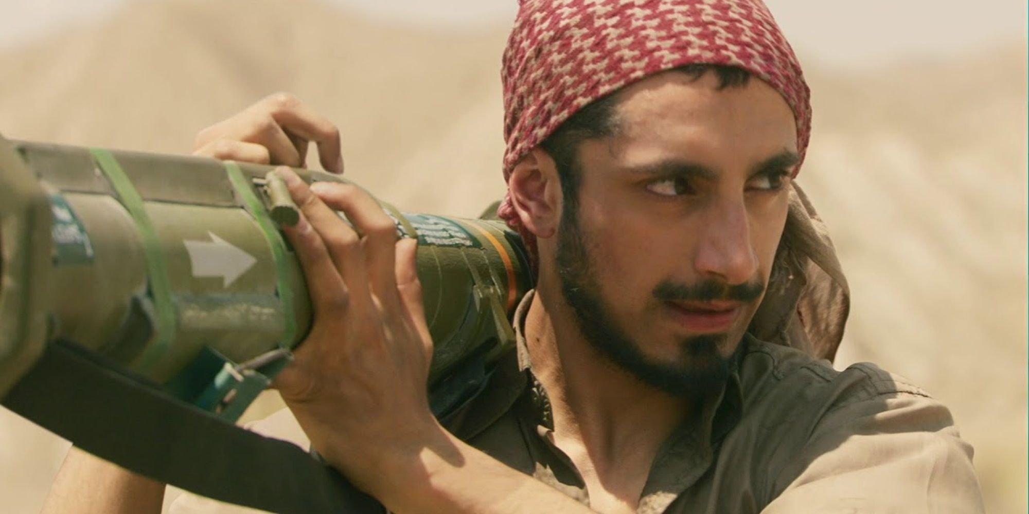 Riz Ahmed with a rocket launcher in Four Lions