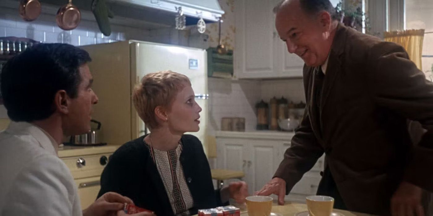 Rosemary sitting at a table in Rosemary's Baby