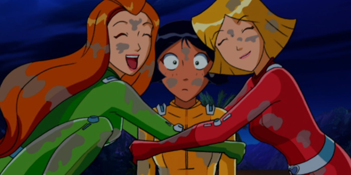 Sam and Clover covered in mud and hugging Alex in Totally Spies!