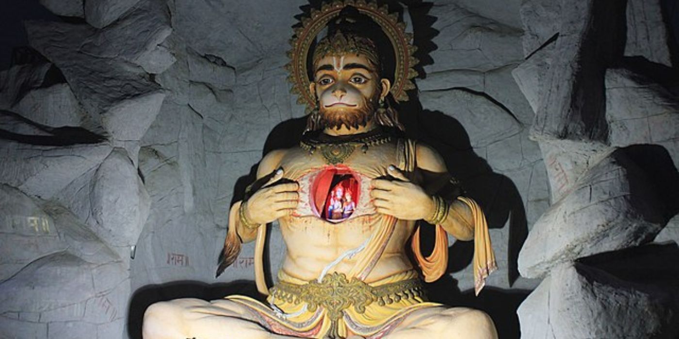A statue of the Hindu deity Hanuman opening his chest 