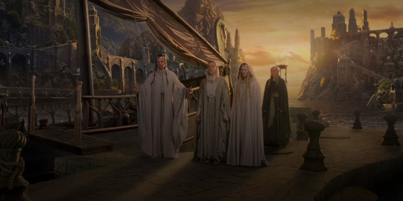 Círdan standing in a blue robe behind Galadriel, Elrond, and Celeborn in the Return of the King.