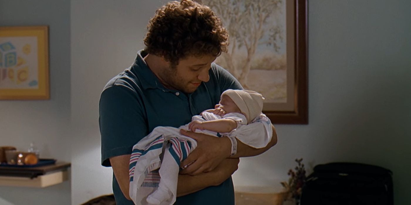 Seth Rogen as Ben Stone Holding His Infant Daughter in Knocked Up