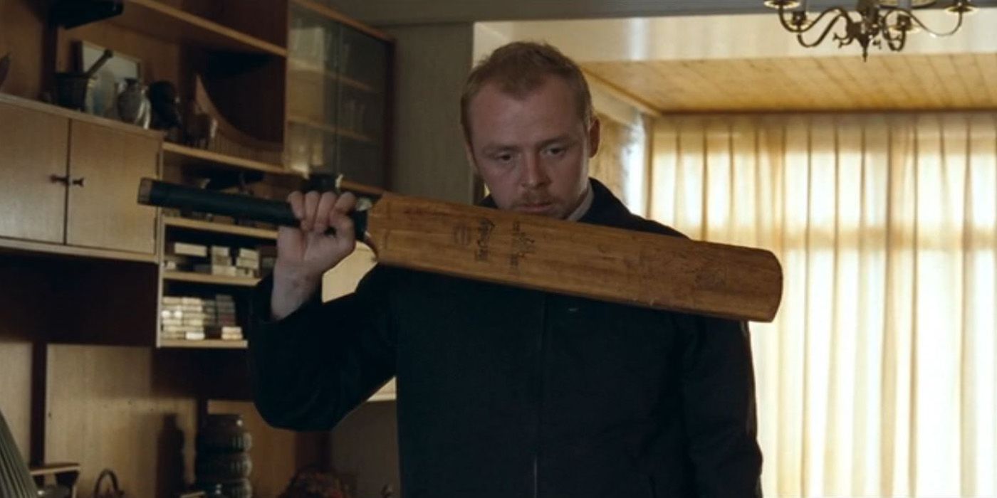 Shaun with the paddle he wants to kill Philip with in Shaun of the Dead