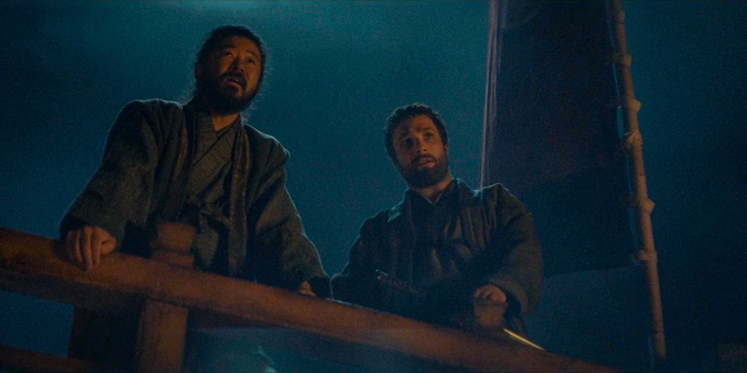 Yabushige and Blackthorne on a boat, looking towards the horizon in Shogun season 1 ep 8