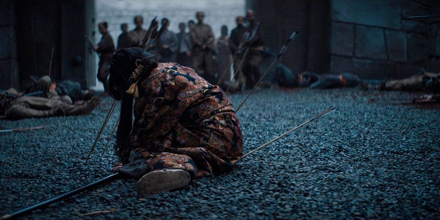 Mariko lying on the ground surrounded by some arrows in Shogun season 1 Ep 9 
