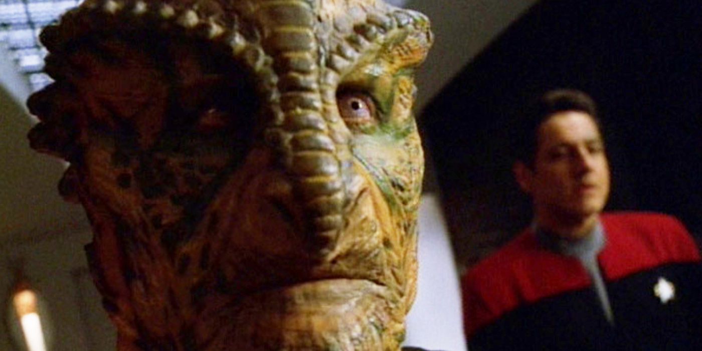 Gegen and Chakotay stand a little ways apart in the Star Trek: Voyager season 3 episode 