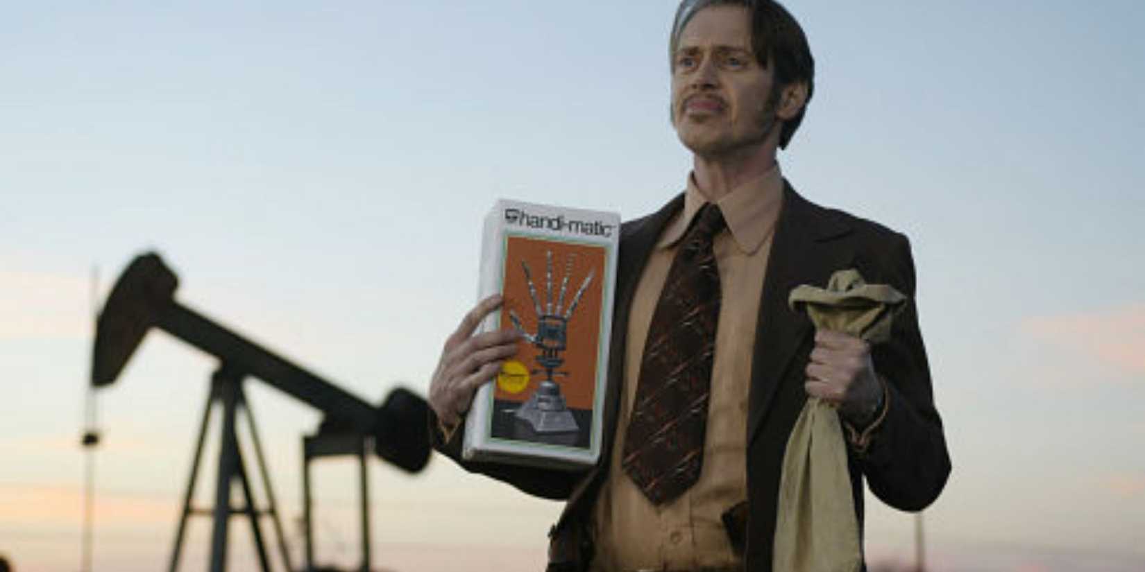 Steve Buscemi in Big Fish holding a bag