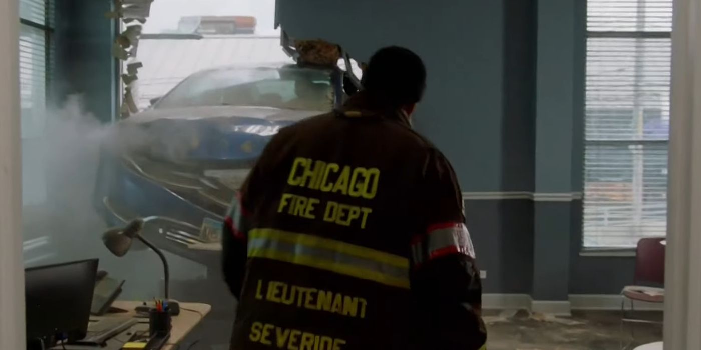Taylor Kinney as Kelly Severide Approaching a Car Stuck in a Wall in Chicago Fire Season 12 Episode 10
