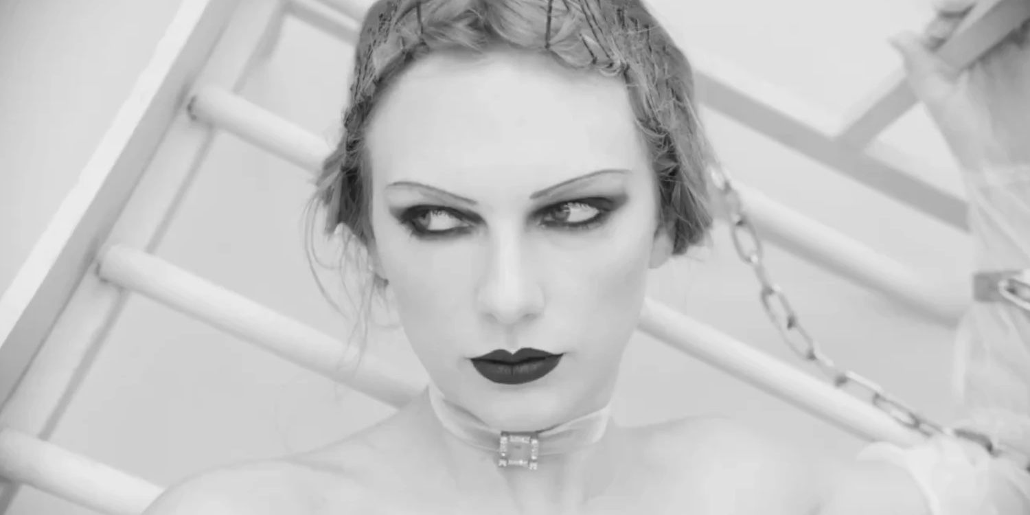 A black and white image of Taylor Swift looking off to the side in the "Fortnight" music video