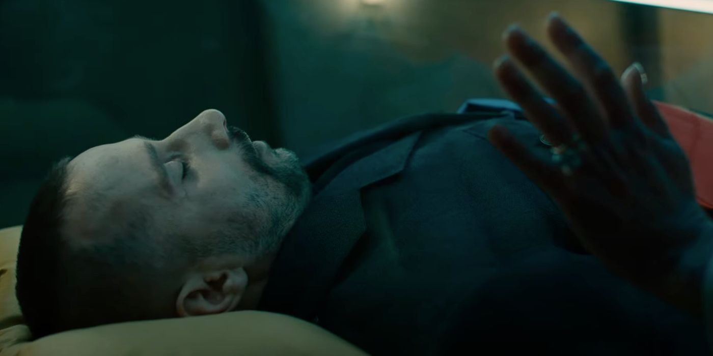 The body of Zubak (Matthias Schoenaerts) in the glass box in The Regime&rsquo;s finale