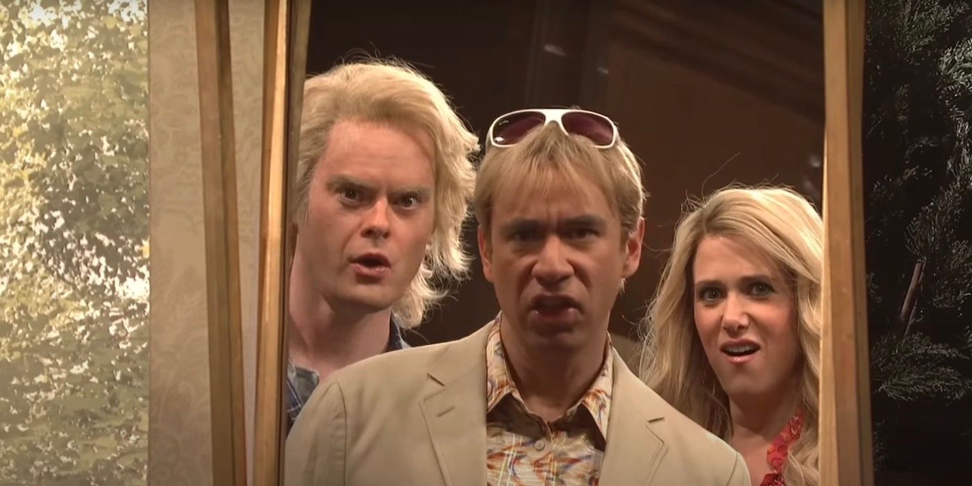 Bill Hader, Fred Armisen, and Kristen Wiig are dramatically looking into a mirror.
