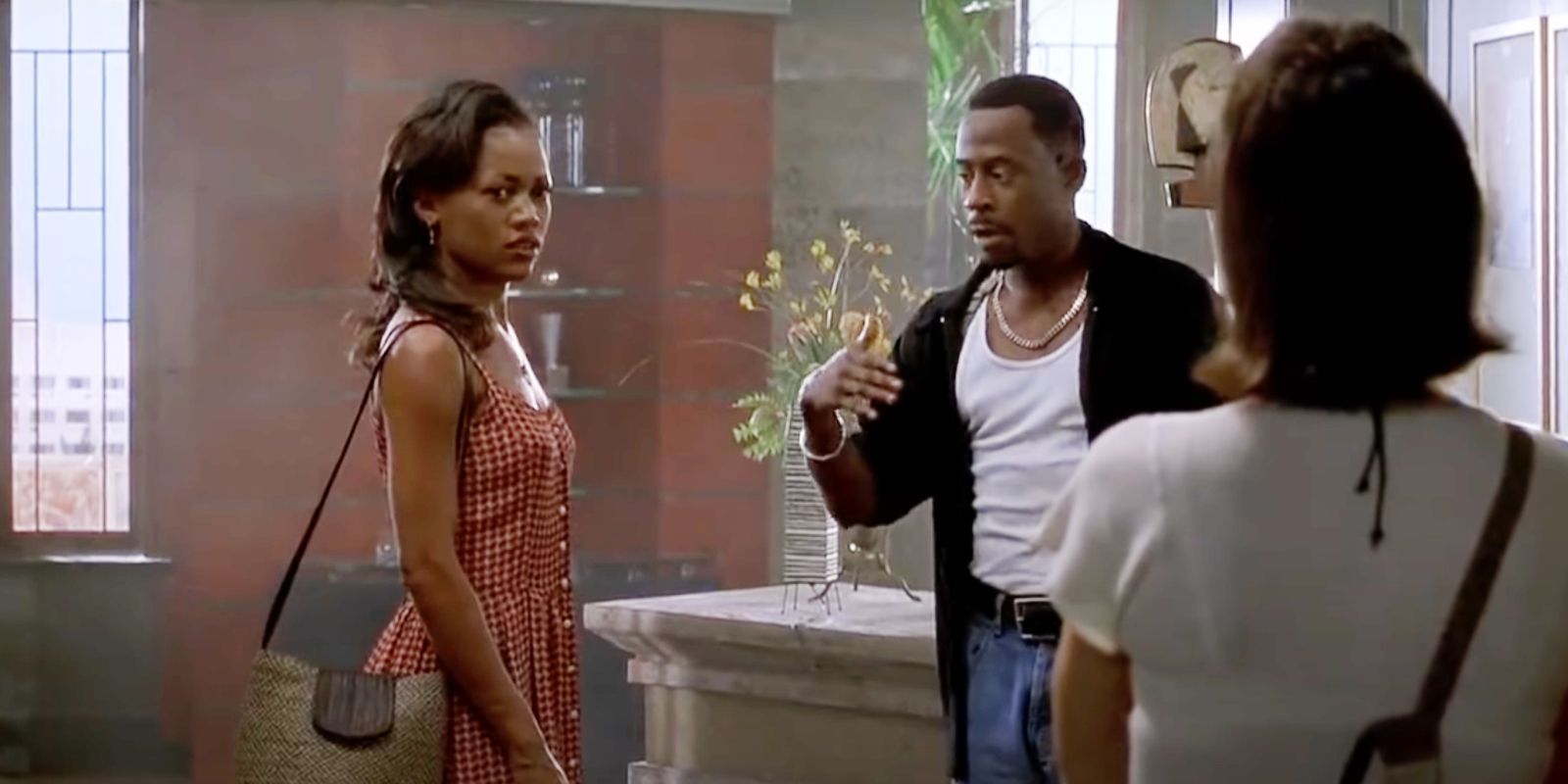 Theresa Burnett and Marcus arguing in front of woman in Bad Boys