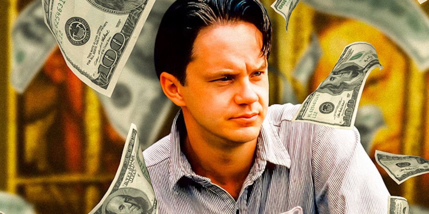 Tim Robbins' Andy from The Shawshank Redemption surrounded by dollars
