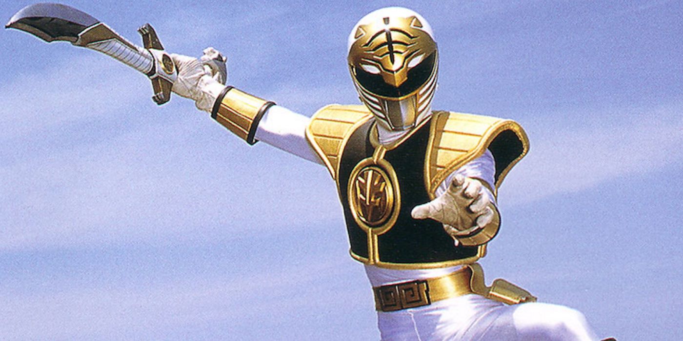 Tommy Oliver as the White Ranger, leaping through the air against a sky blue backdrop.
