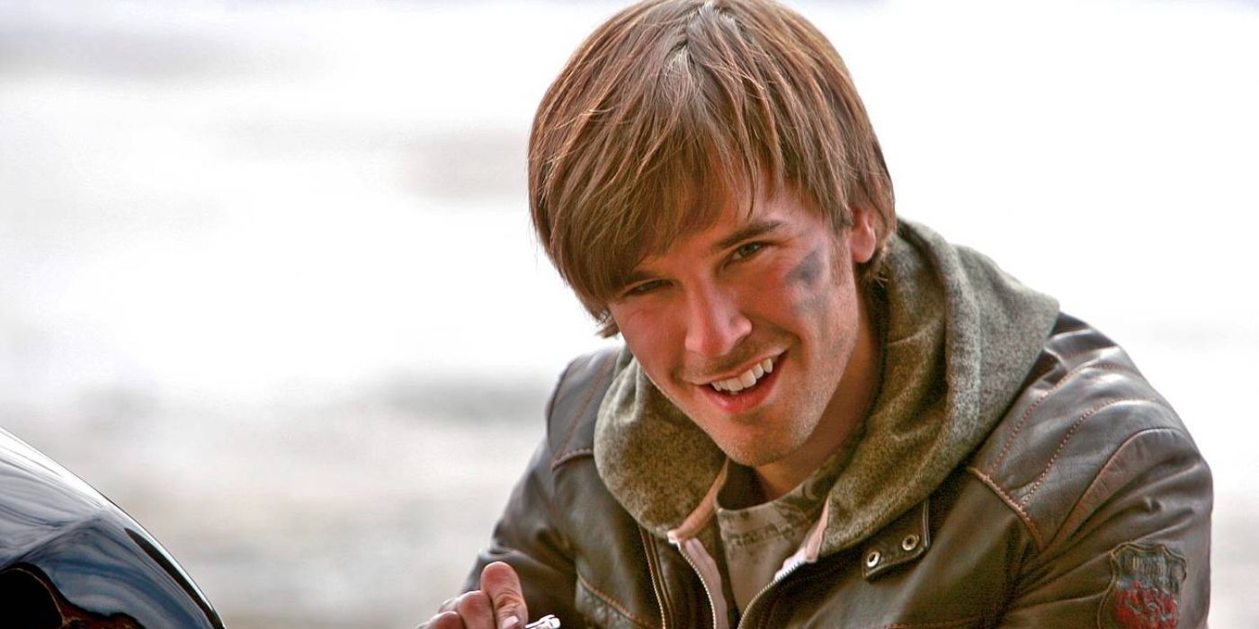 Ty (Graham Wardle) working on a motorcycle in Heartland.