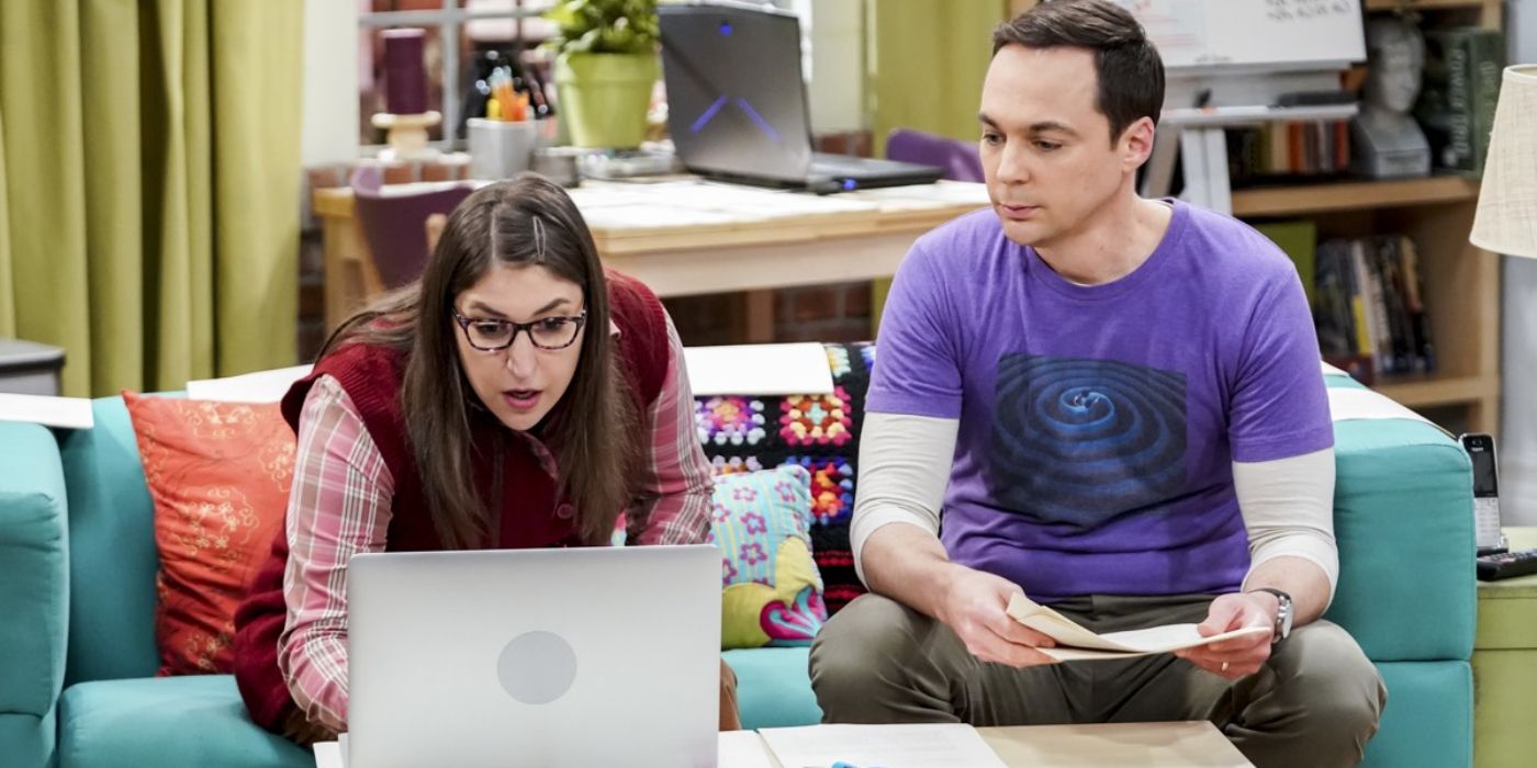 Amy and Sheldon working on their asymmetry theory in The Big Bang Theory