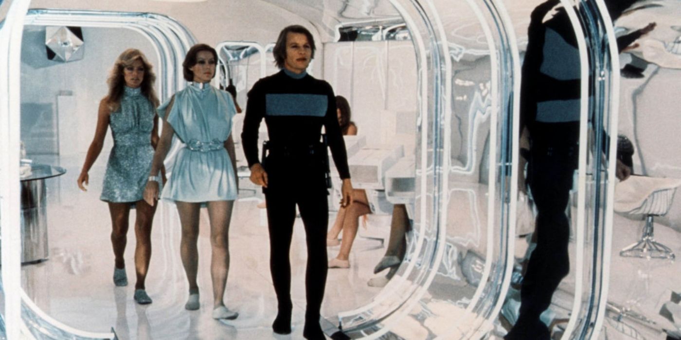 Jessica 6 and Holly 13 following Logan 5 through a hallway in Logan's Run (1976)