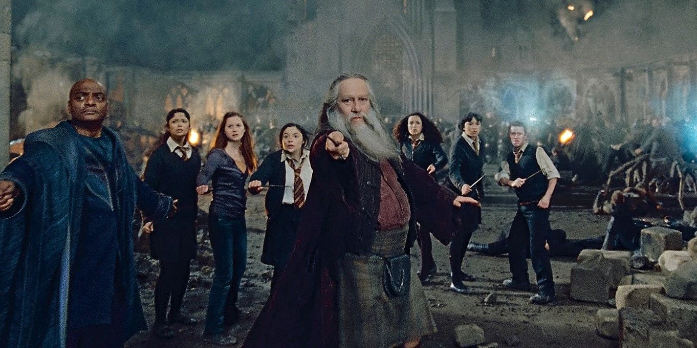 Aberforth Dumbledore in the Battle of Hogwarts protecting Ginny, Katie, and Kingsley in Harry Potter and the Deathly Hallows Part 2
