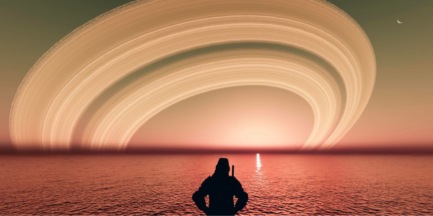 A Starfield player looking out across an ocean while a ringed-planet sits overhead