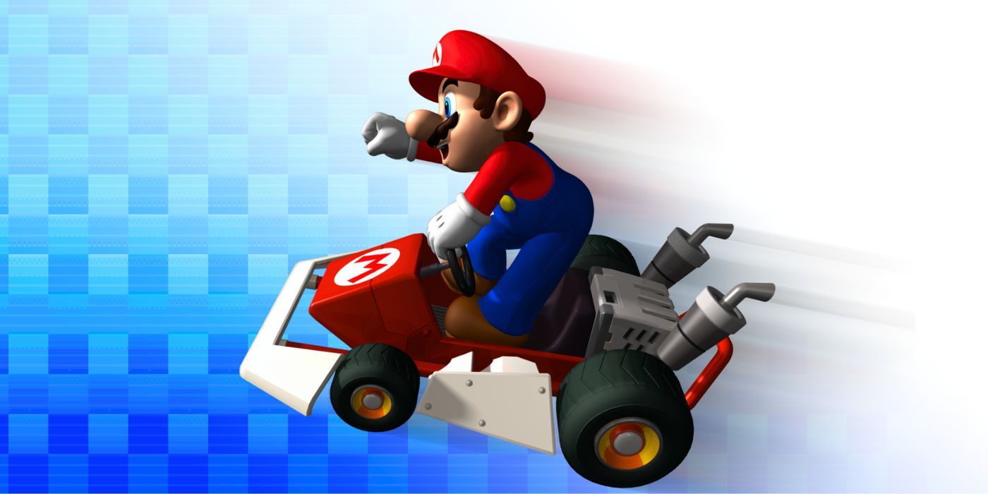 Mario standing up in his go-kart with his fist in the air