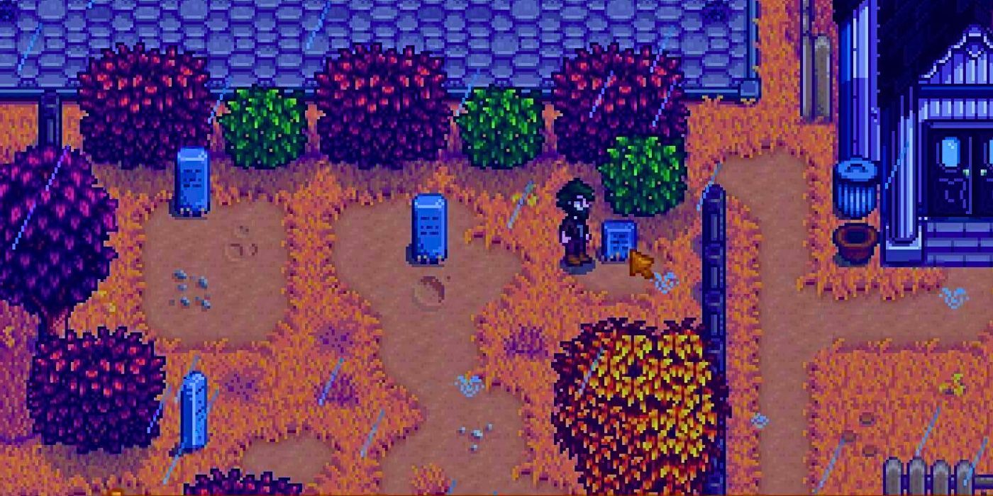The Stardew Valley farmer standing in Pelican Town's cemetery
