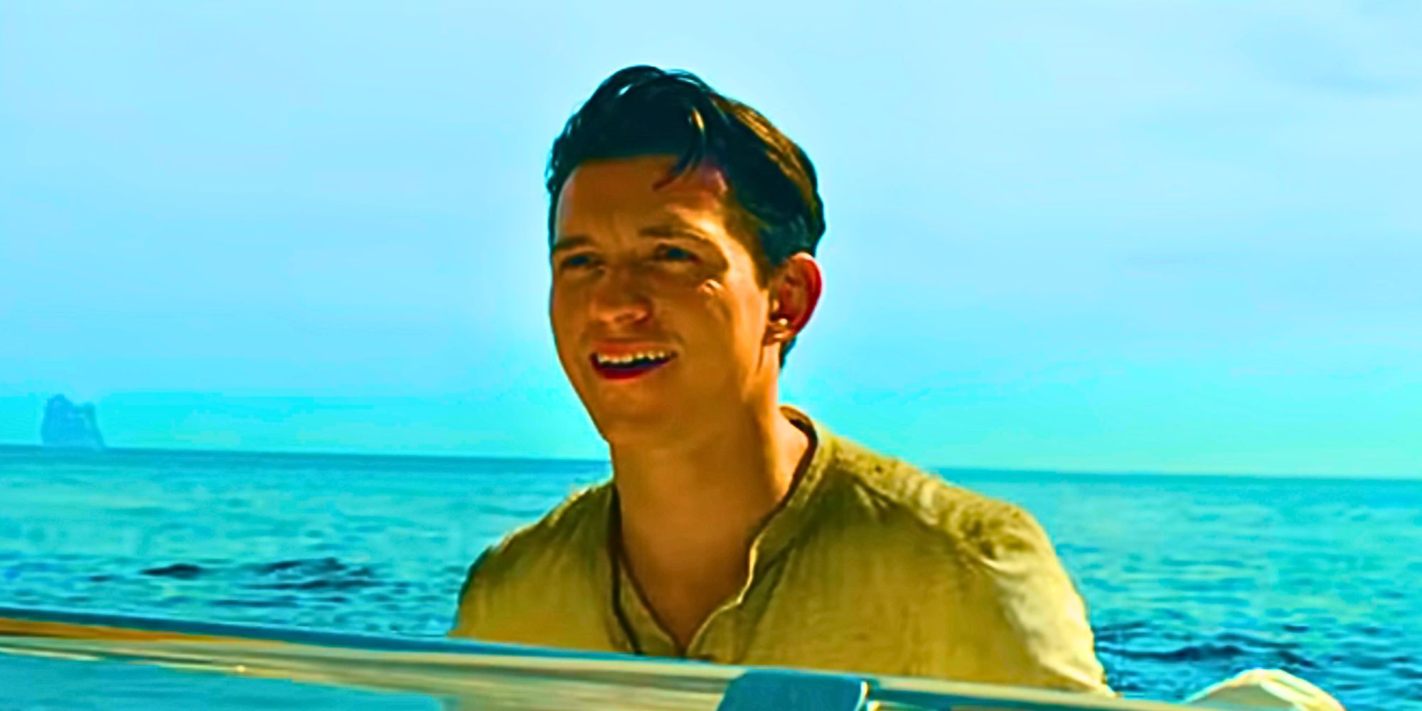 Tom Holland smiling as Nathan Drake in Uncharted