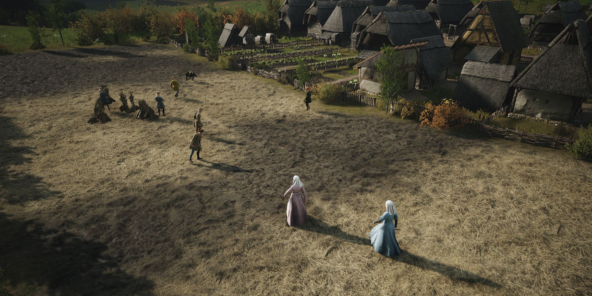 Os aldeões trabalham em um campo em uma captura de tela de Manor Lords.