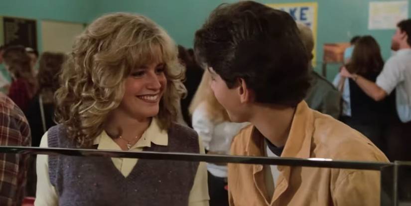 Elizabeth Shue as Ali Mills smiling at Daniel (Ralph Macchio) in The Karate Kid (1984)