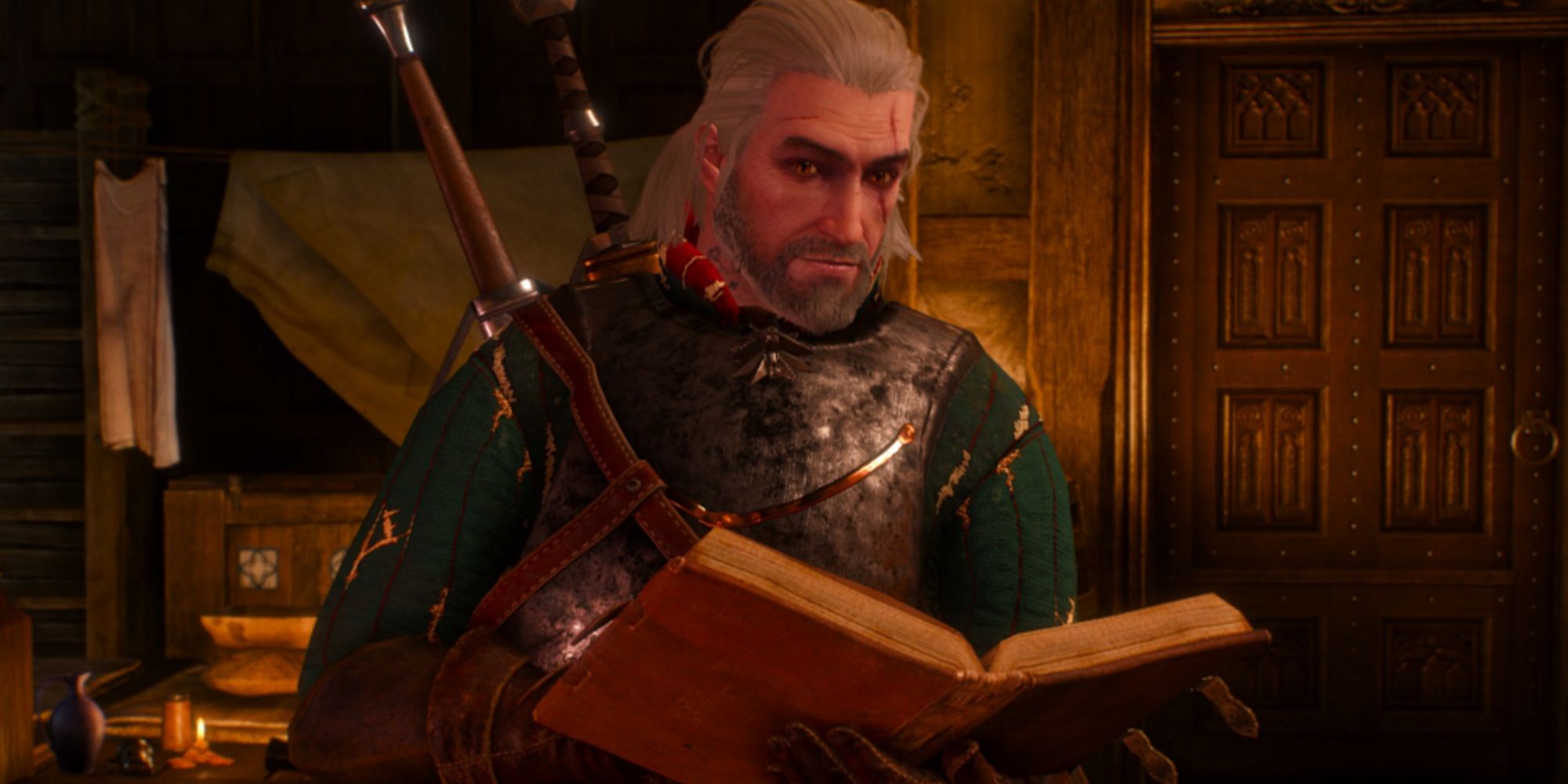 Geralt looking up from a book and smiling