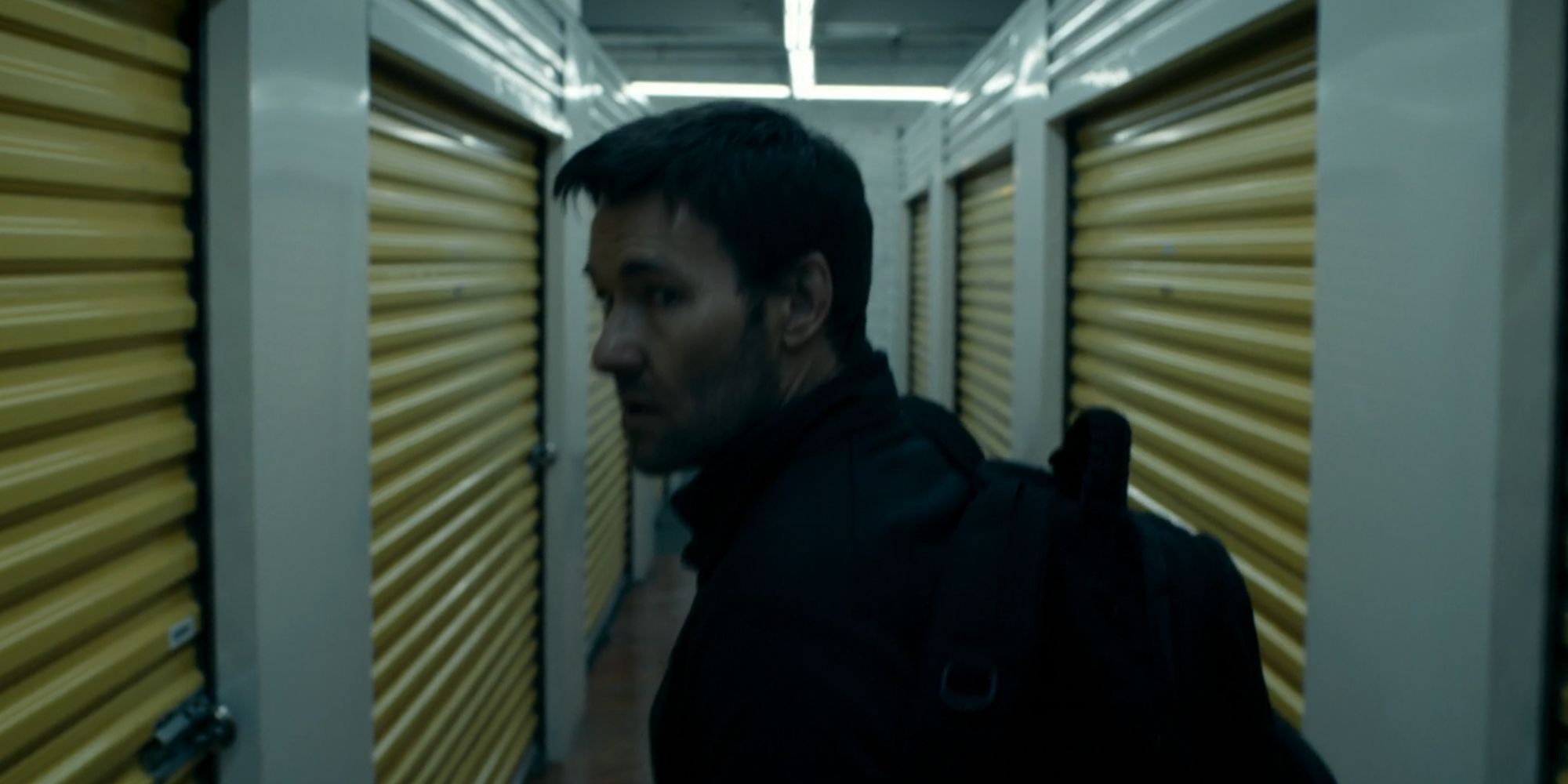 Joel Edgerton as Jason2 in a storage facility in Dark Matter