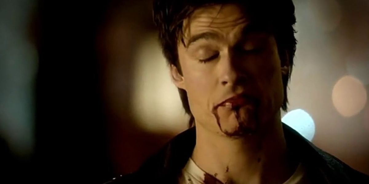 Damon making a face with blood in The Vampire Diaries