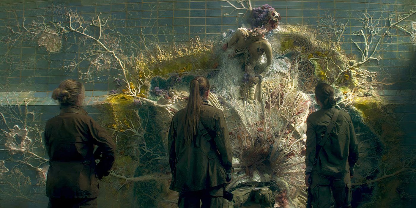 A mutated skeleton and fungi from Annihilation while three woman watch