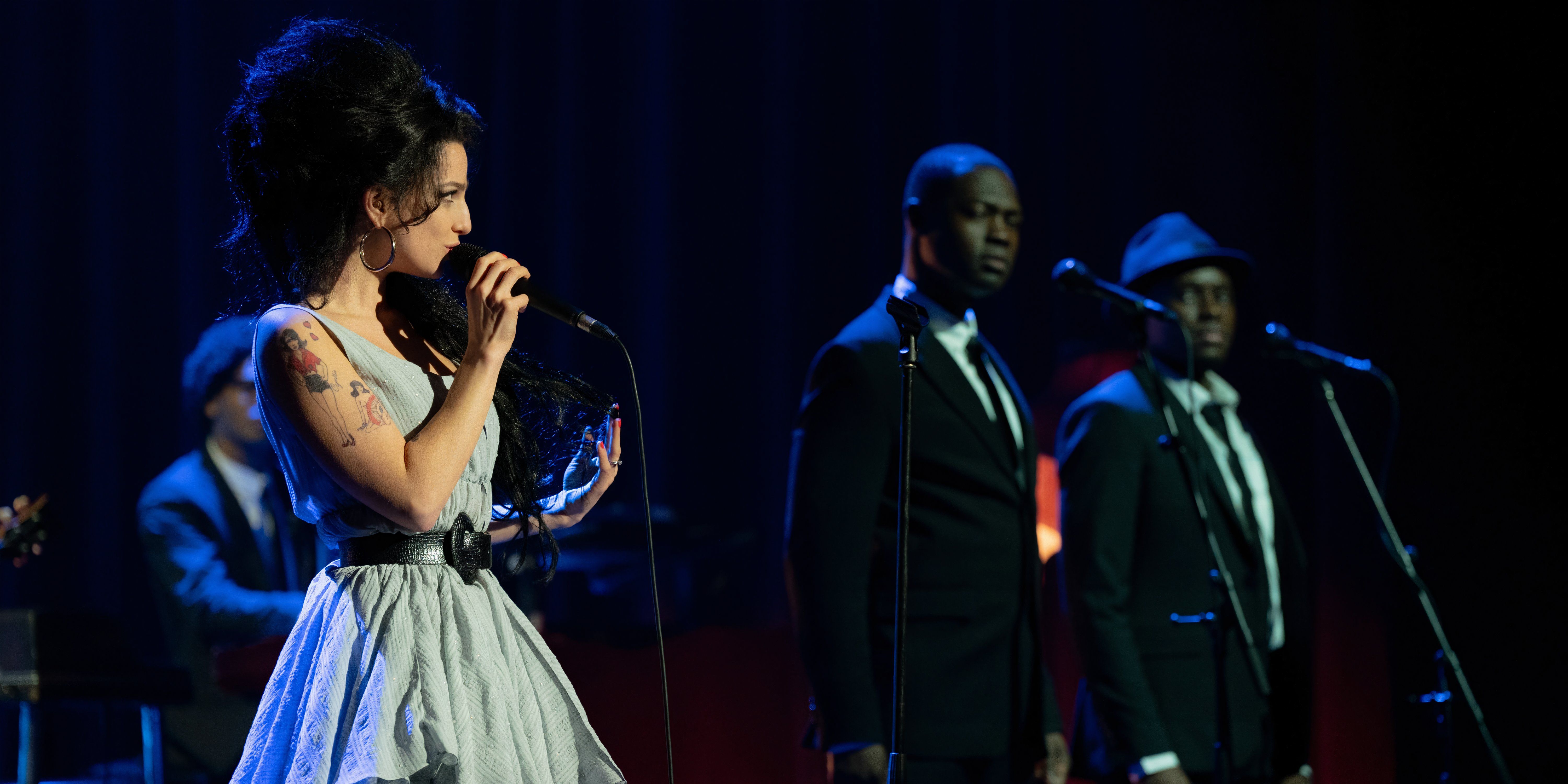 Amy Winehouse sings onstage in Back to Black still