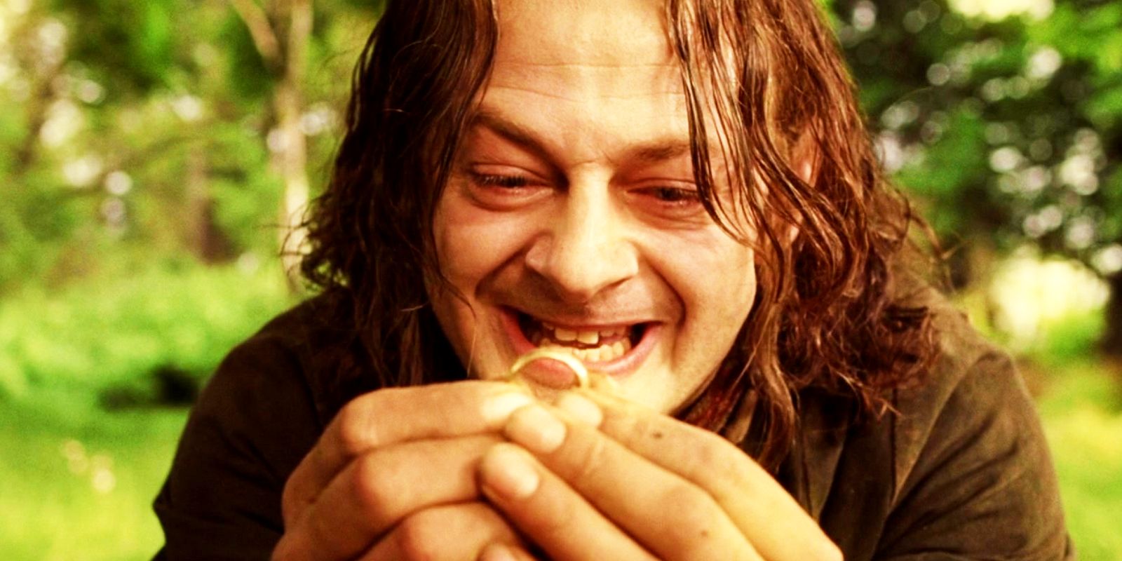Andy Serkis as Smeagol aka Gollum holding the Ring in The Lord of the Rings The Return of the King