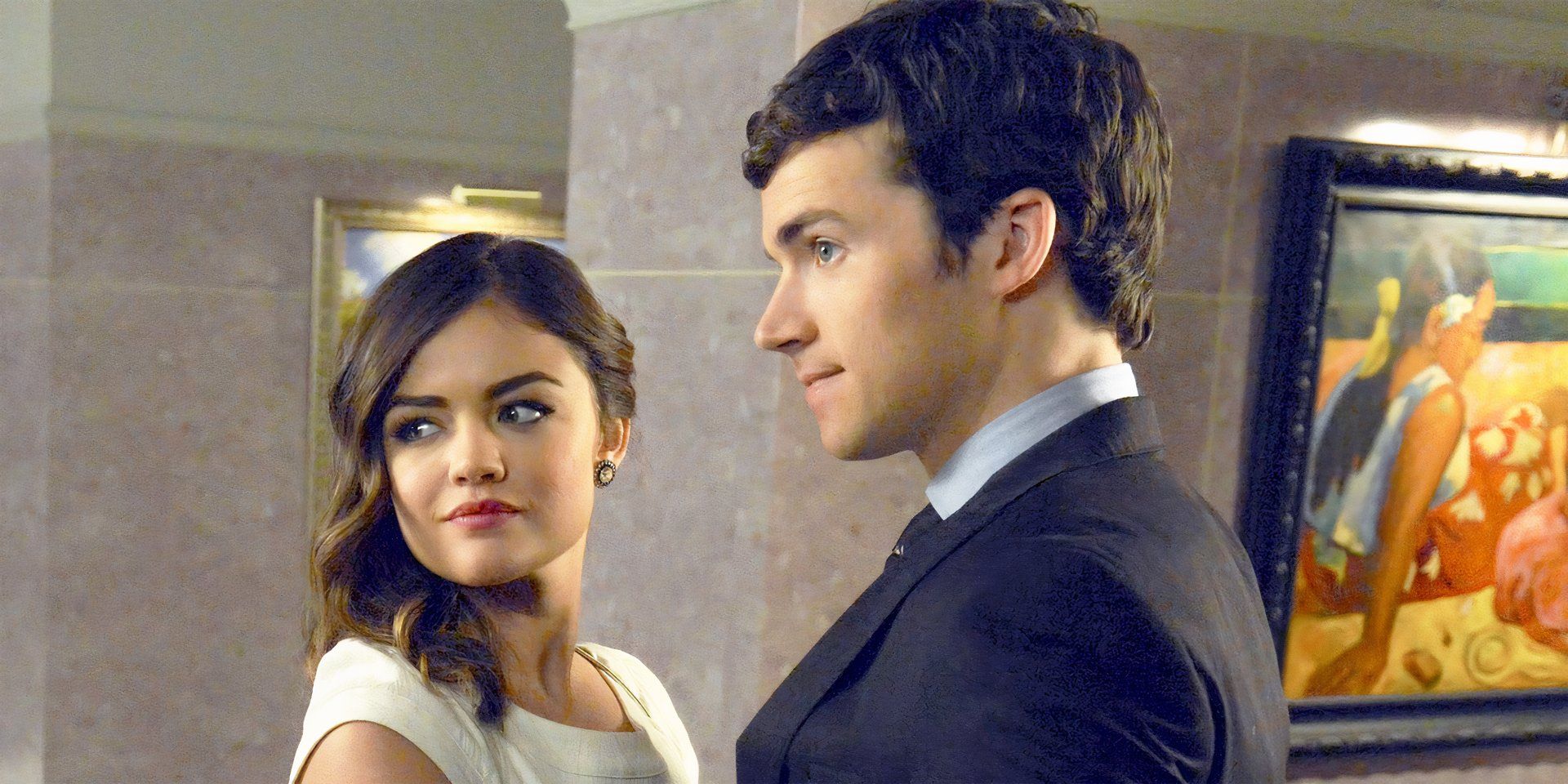 Aria and Ezra standing together in Pretty Little Liars