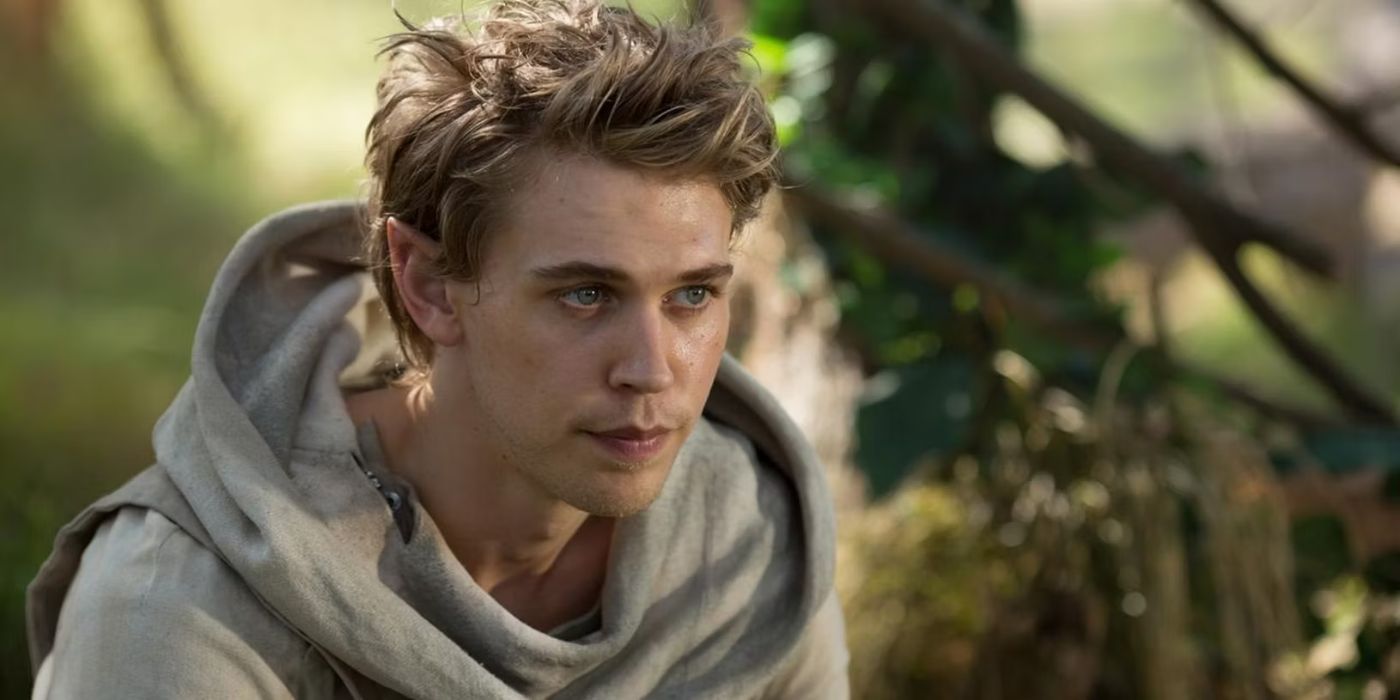 Austin Butler as Wil Ohmsford sat in a forest looking ahead in The Shannara Chronicles.