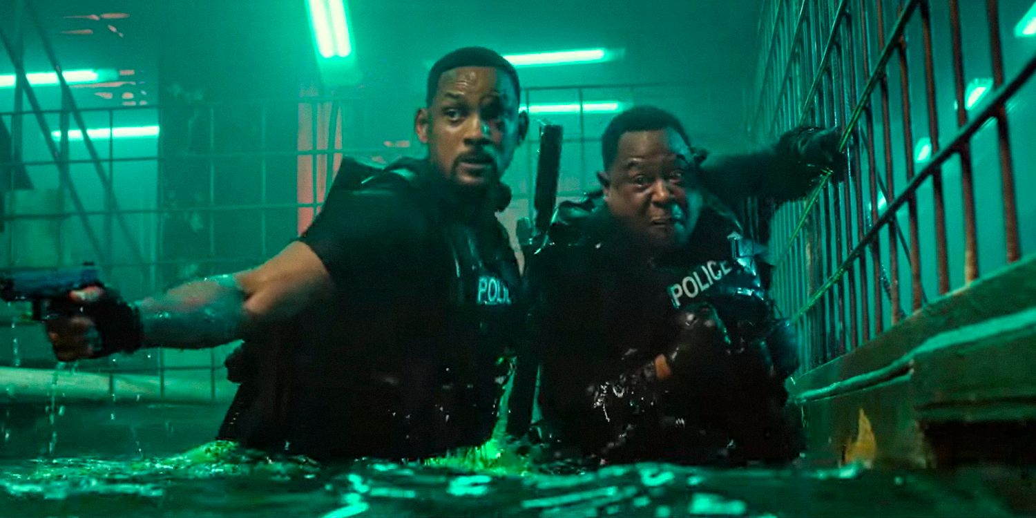 Will Smith as Mike and Martin Lawrence as Marcus wearing bulletproof vests in a deep drainage system in Bad Boys: Ride or Die