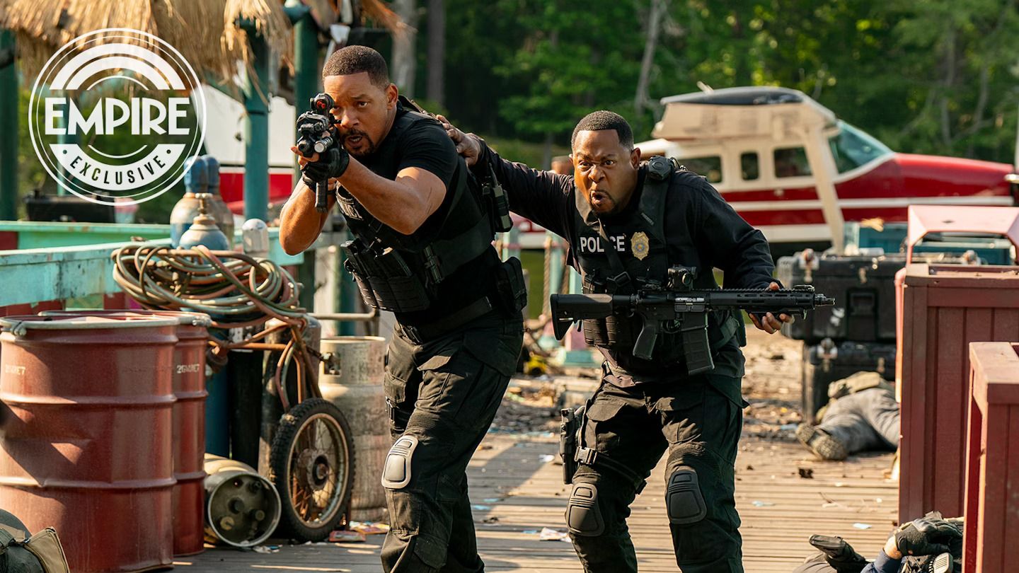 Will Smith and Martin Lawrence with guns on a dock in Bad Boys: Ride or Die