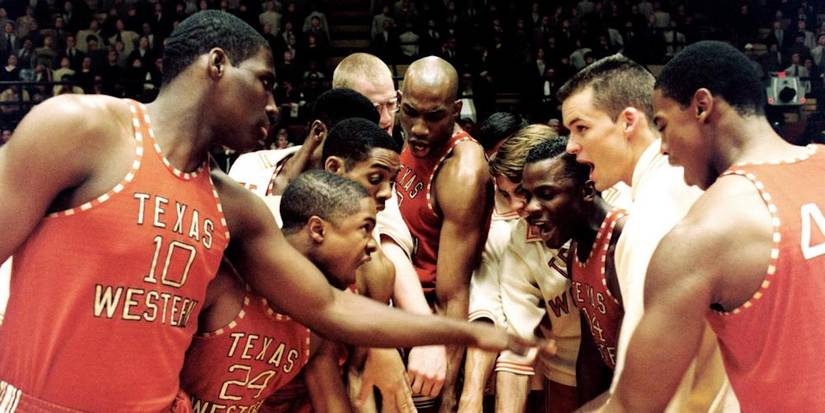 The team in a huddle in Glory Road