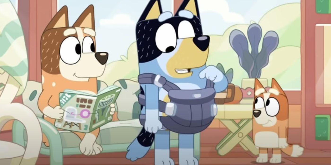 Chilli reading a magazine while Bingo looks at Bandit, who's wearing a baby carrier in Bluey